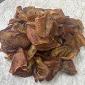Pile of Extra Large natural dog treats pigs ears
