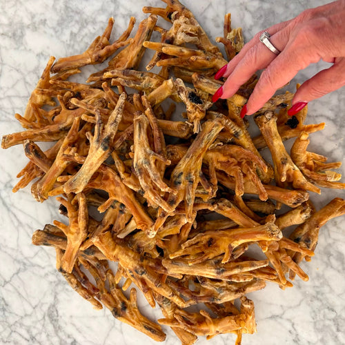 Bundle of 1kg of natural chicken feet dog treats sold by The Natural Dog Treats Company