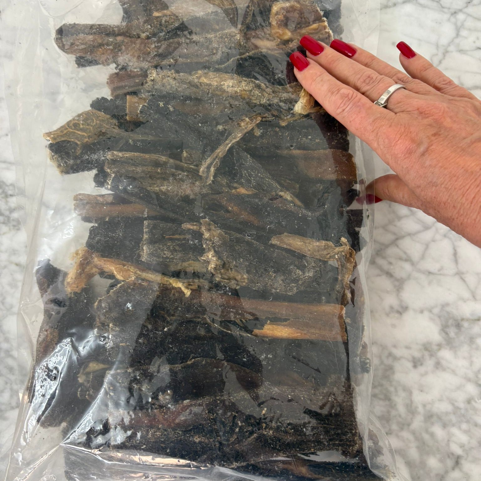 1kg bag of natural tripe stick dog treats.